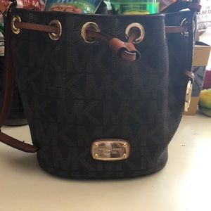 Micheal Kora bucket purse and wallet